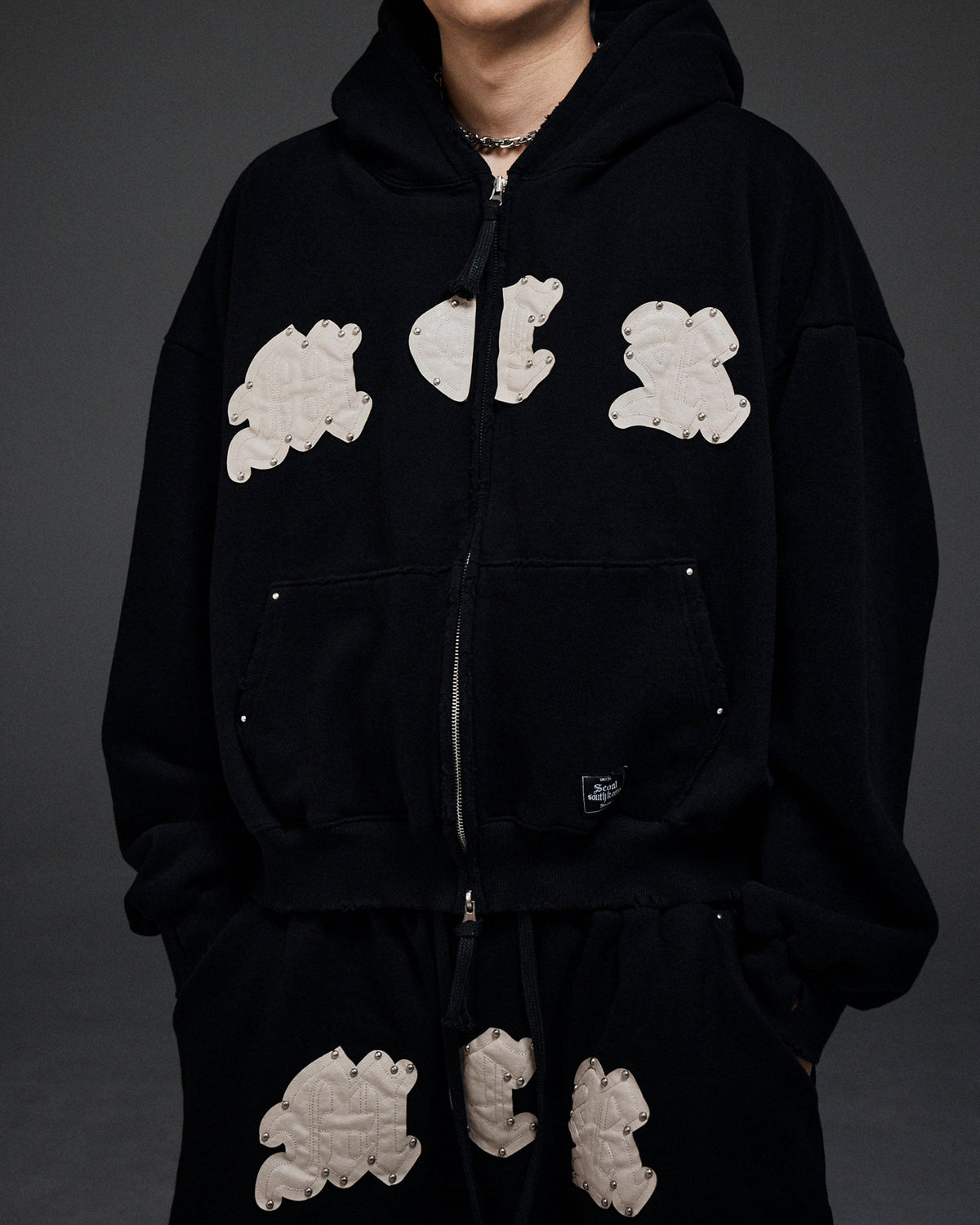 M.C.R. code stud zip-up HD BK