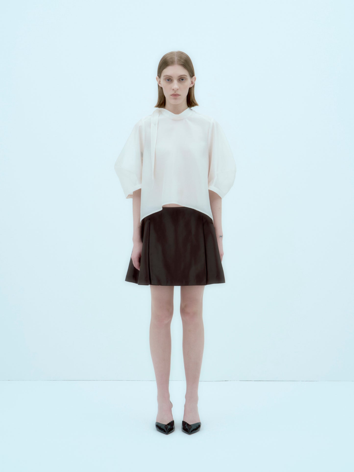 [ARIK.] [25SS] ALKES Panel flare skirt Umber Brown