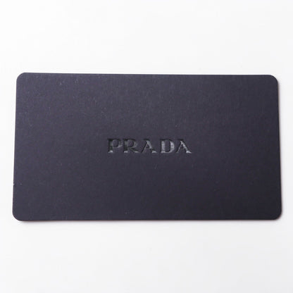 PRADA Re-Nylon bucket hat with triangle logo and mini pouch 2HC282 2DMI