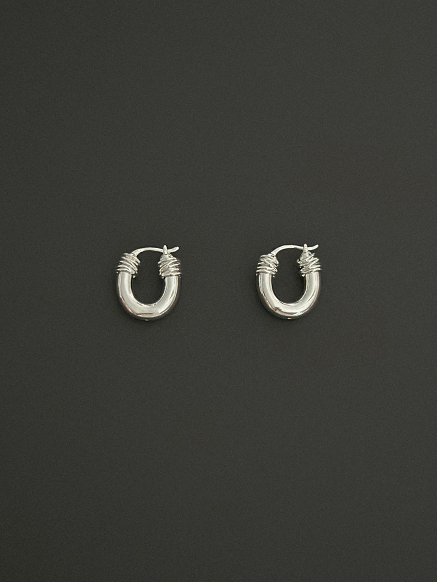 Tie archive earring