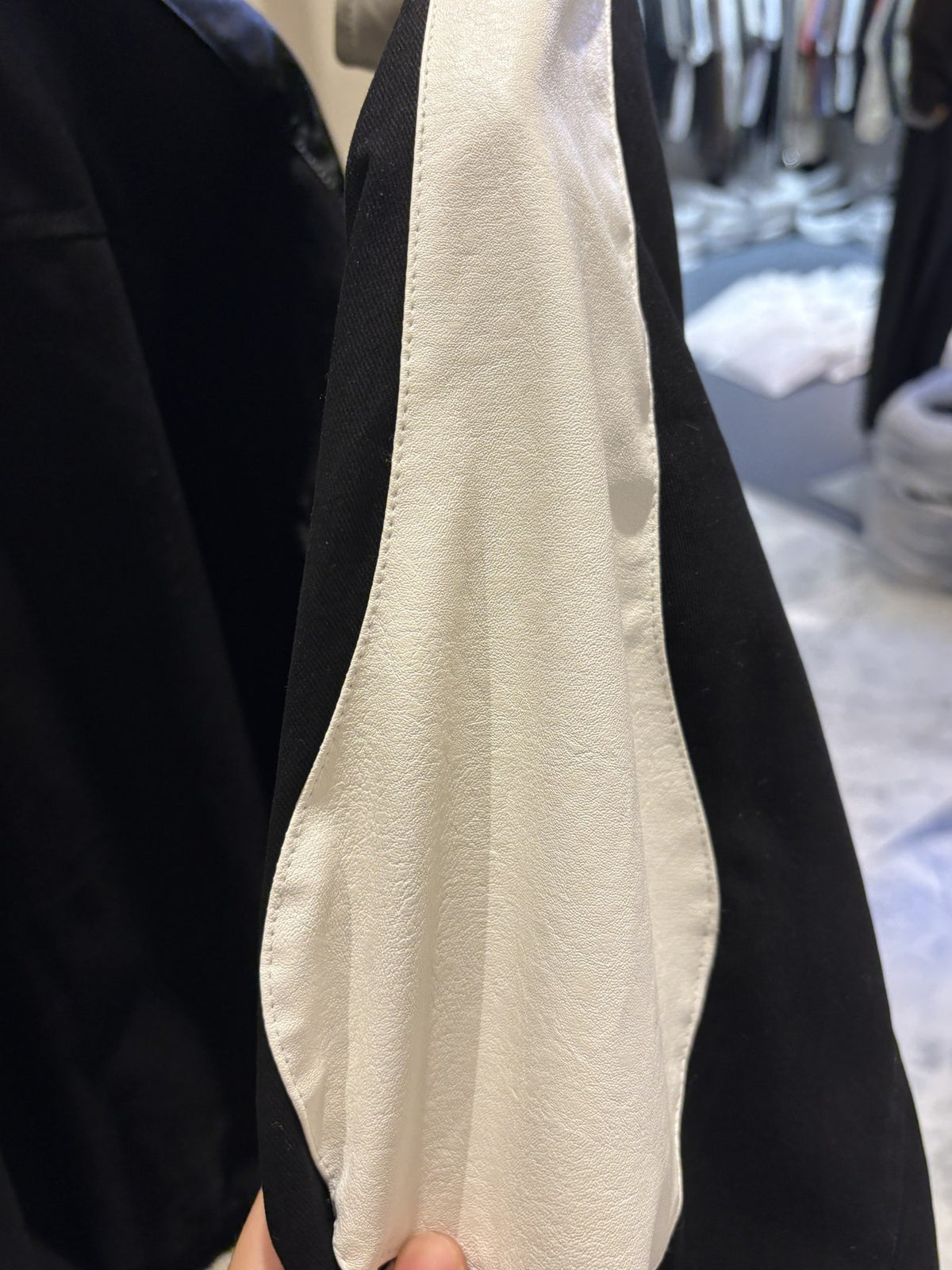 Leather Contrast Cationic Jumper sleeve detail