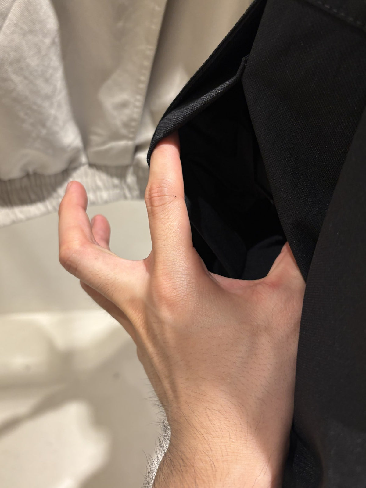 Wing Cut Jumper pocket detail